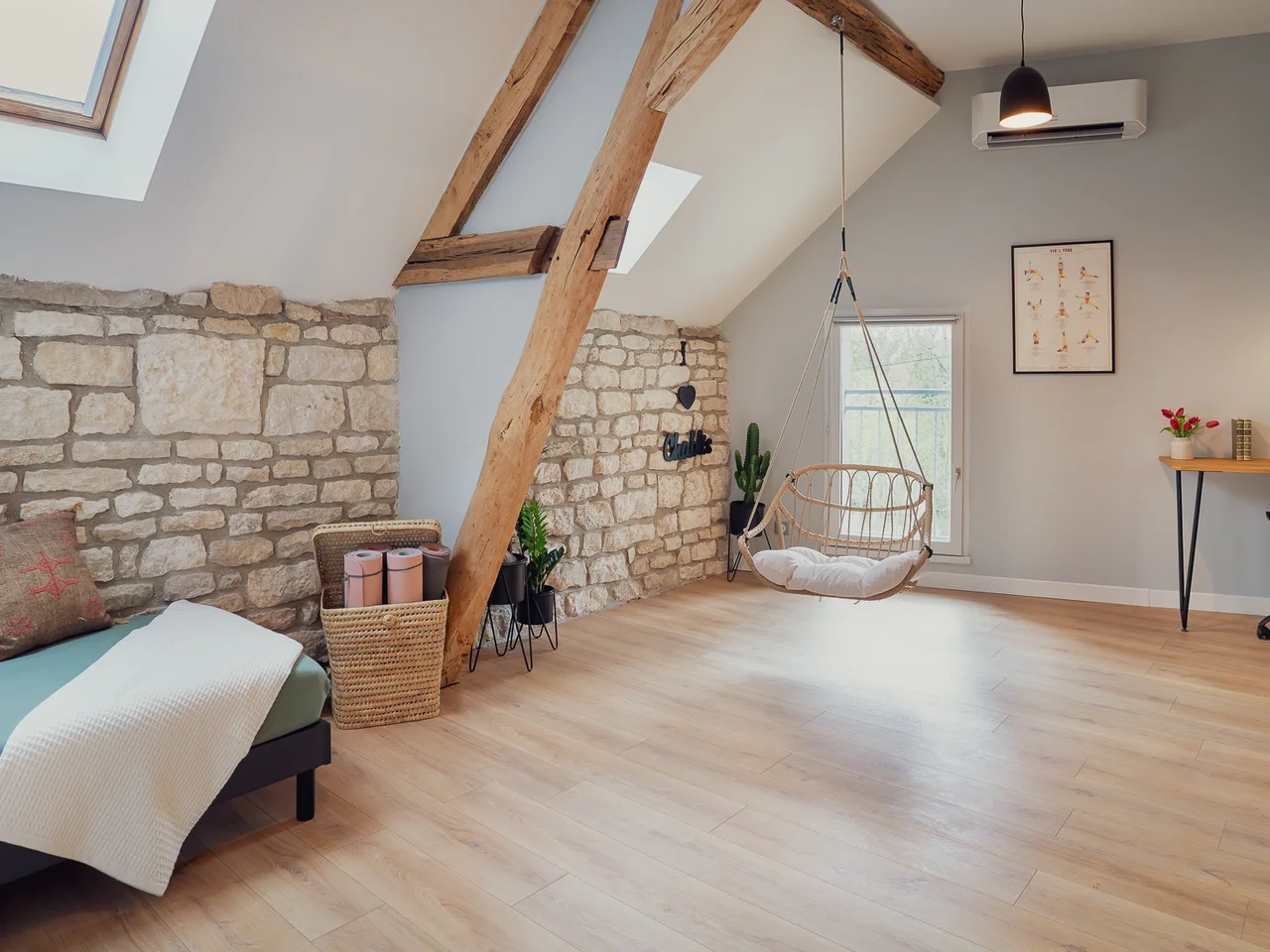 Attic landing with hanging chair and yoga area